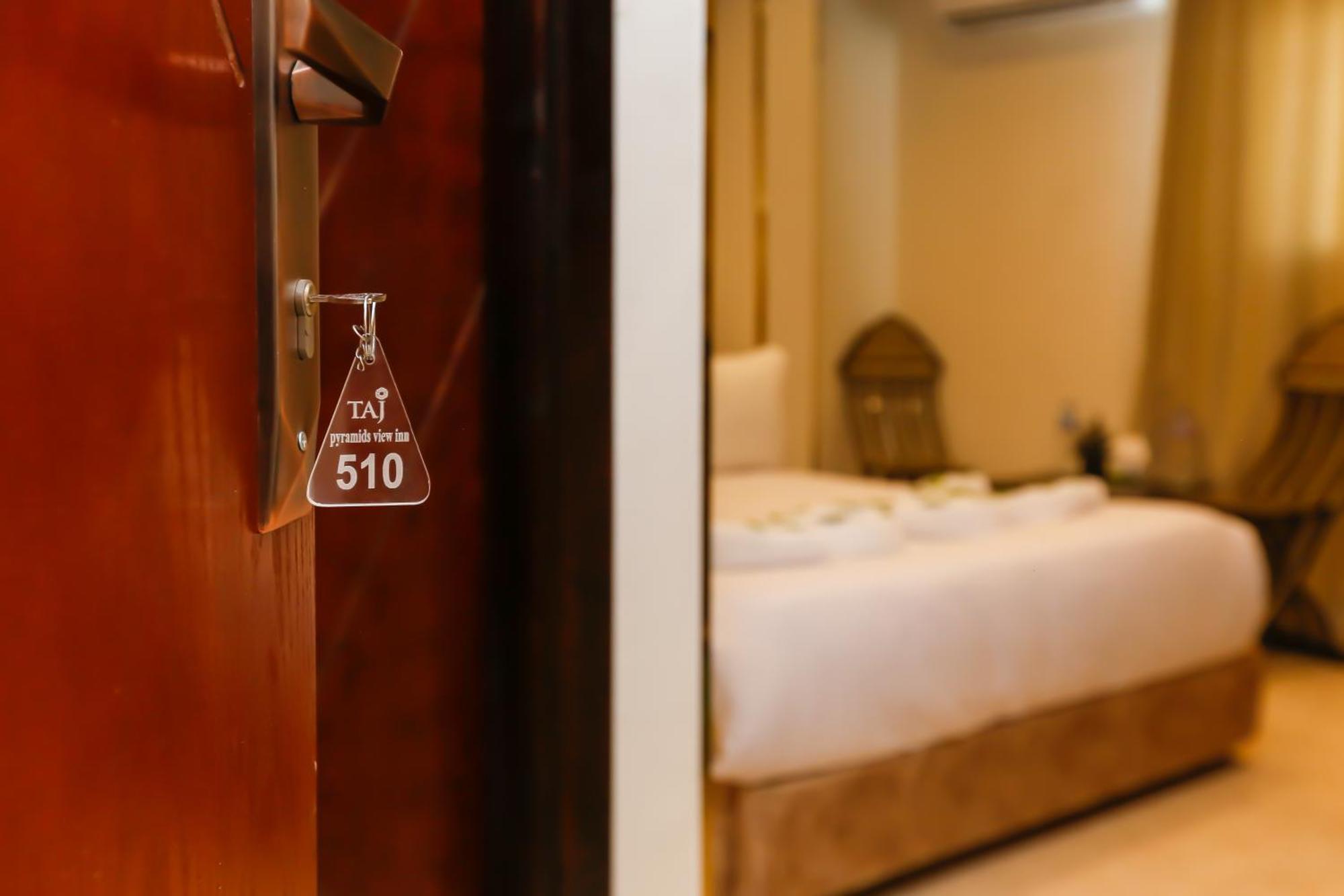 Taj Pyramids View Inn Kafret el-Gabal Exterior photo